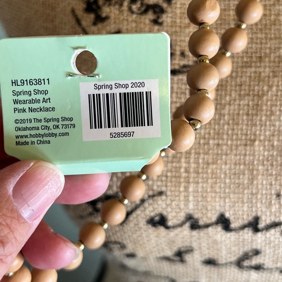 Long Wooden Bead Necklace With Gold Ring - Picture 7 of 7